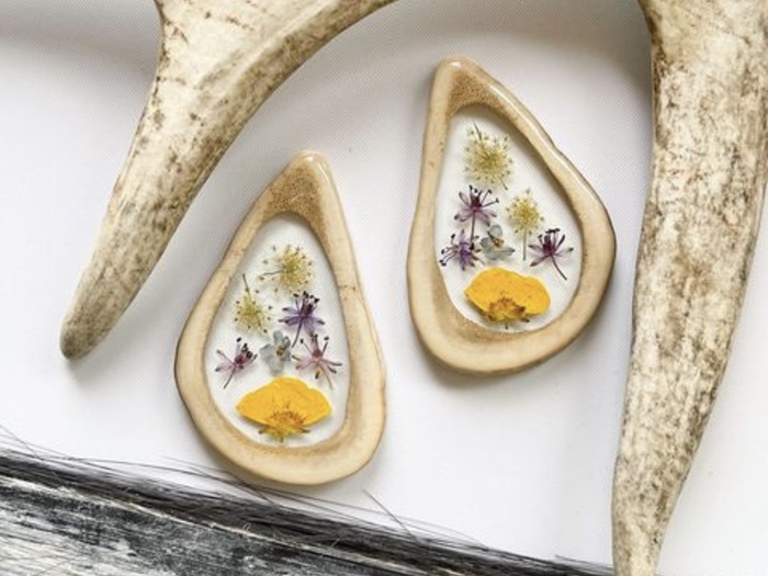 Mixed wild flowers in caribou antler