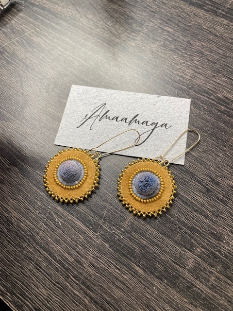 Moosehide earrings (2023) caribou hair, moosehide, Charlotte cuts and 24k gold beads