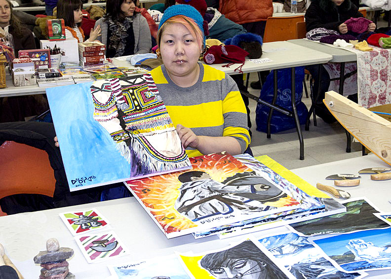 Okatsiak with her work (2013)