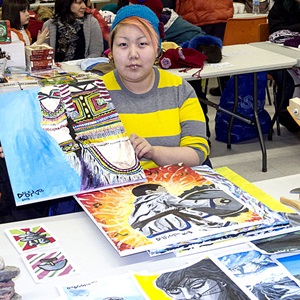 Okatsiak with her work (2013)
