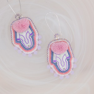 Tufted Amauti (2024) acrylic centre with dyed caribou fur and beadwork