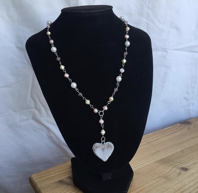 Pearl and crystal necklace with sealskin pendant (2024)
