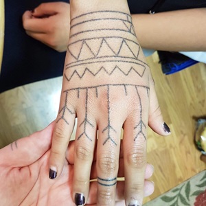 Hand-poked tattoo (n.d.)