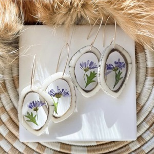 Purple Flowers in elk antler