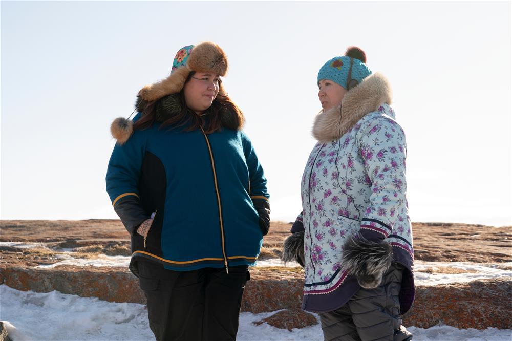 (L to R) Co-ShowrunnerExec. Producer Stacey Aglok MacDonald, Co-ShowrunnerExec. Producer Alethea Arnaquq-Baril in episode 101 of North of North (Courtesy of APTN, CBC, Netflix; photo taken by Jasper Savage)