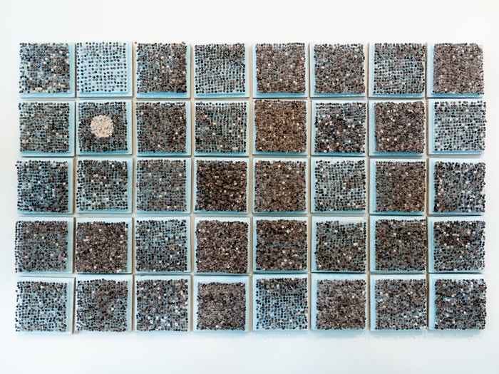 Maureen Gruben. Breathing Hole (detail), 2019. Dricore insulation board, stainless steel pins, sealskin, white cotton thread. 121.9 x 76.2 cm.  (2)