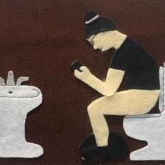 KablusiakLookingAtFacebookCrop