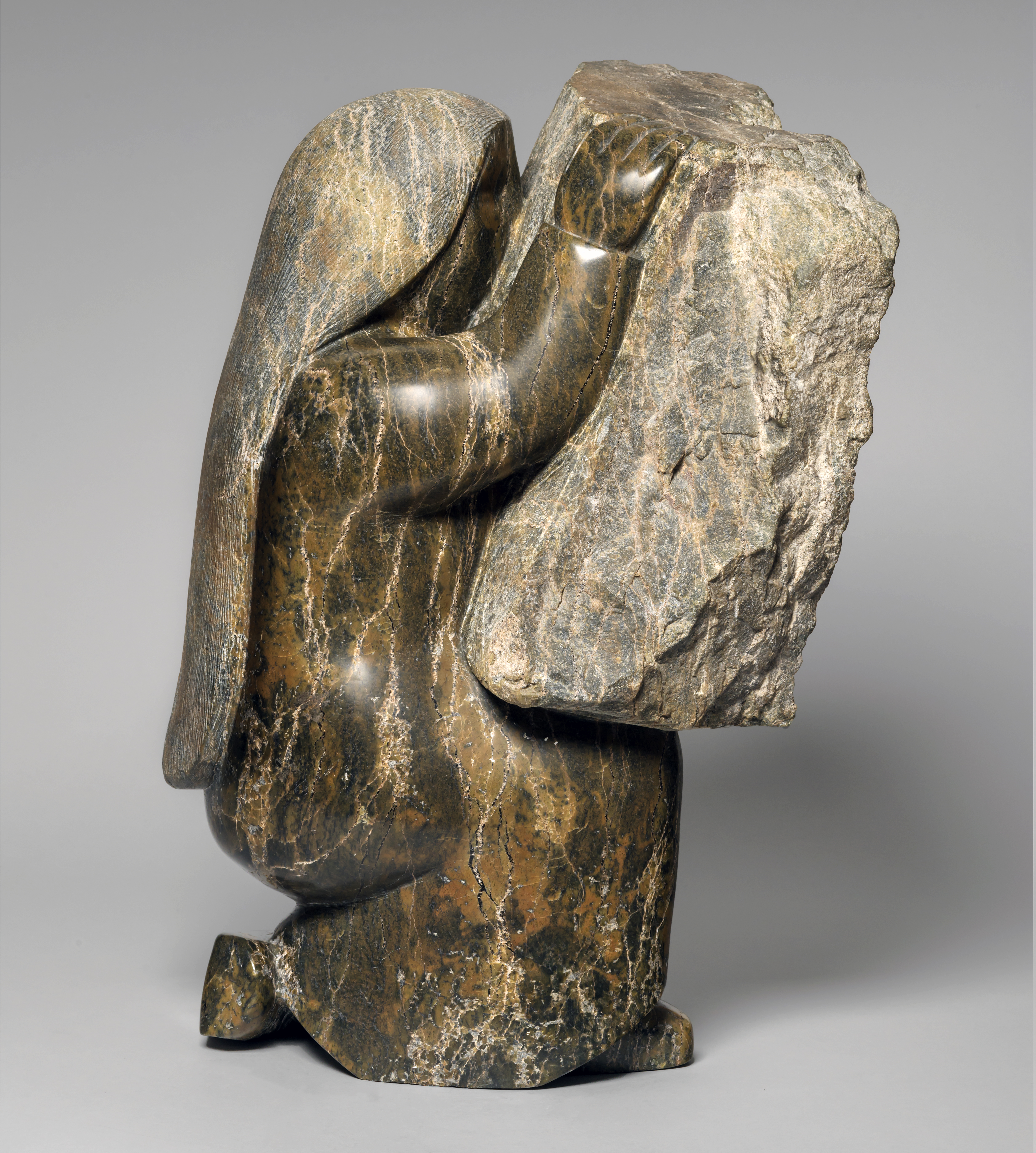 TunnillieOvilooSelfPortraitWithCarvingStone