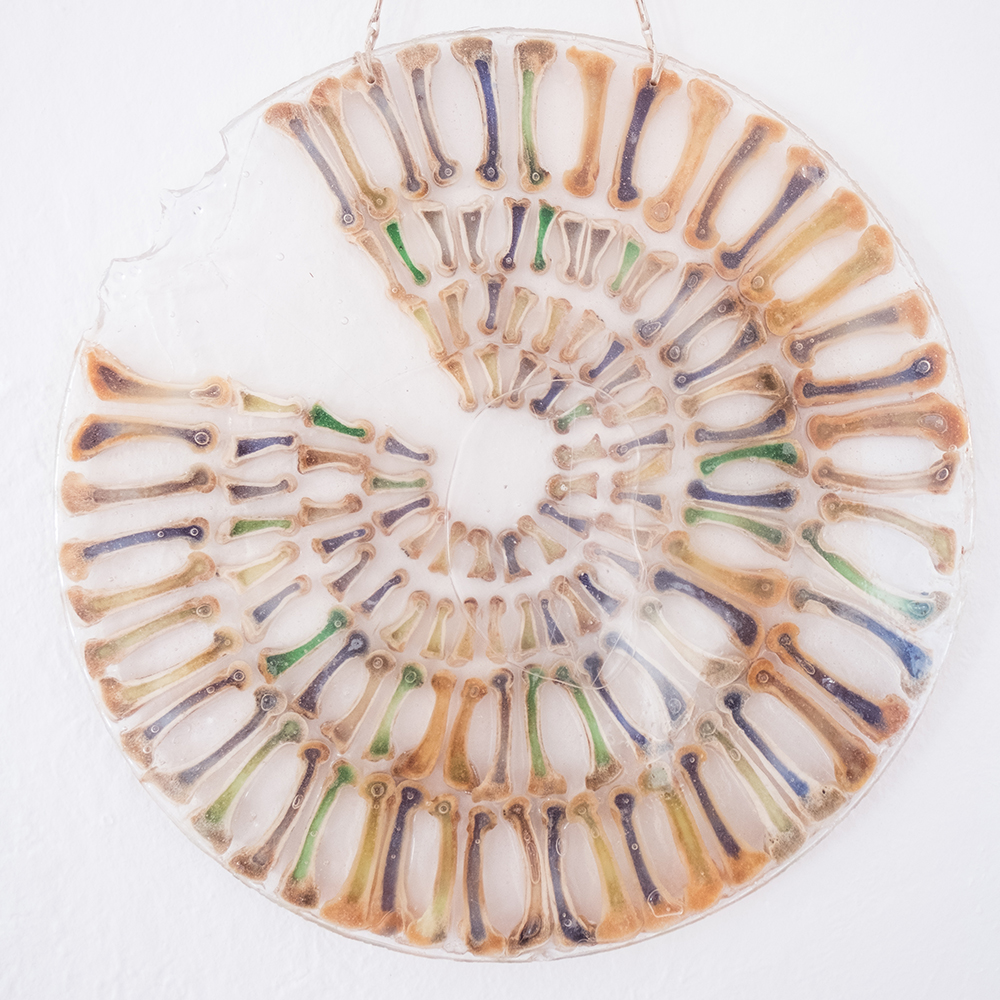 Maureen Gruben. Inuvialuit (b. 1963 Tuktuyaaqtuuq). Waiting for the Shaman, 2017. Bones from polar bear paws and resin. 55.9 û 55.9 û 2.5 cm. Photo Kyra Kordowski.