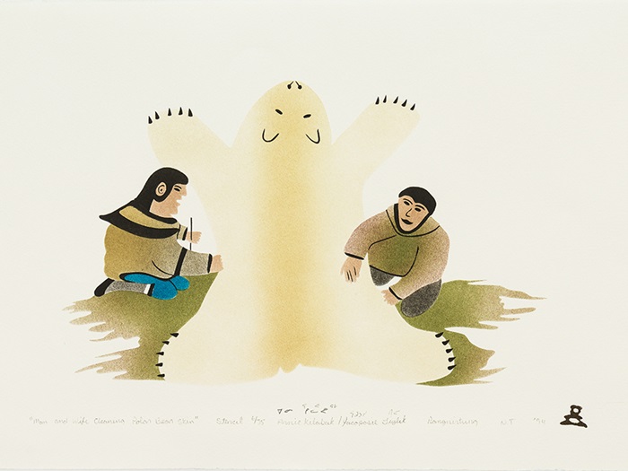 39.2_Feature2_AKilabuk_Man-and-Wife-Cleaning-Polar-Bear-Skin